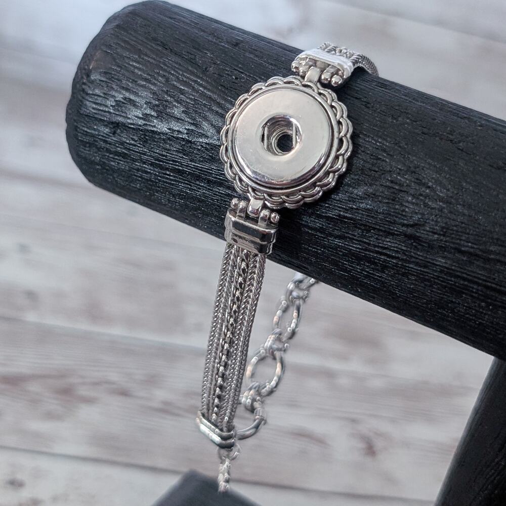 Silver Tone Bracelet - Missing Something?